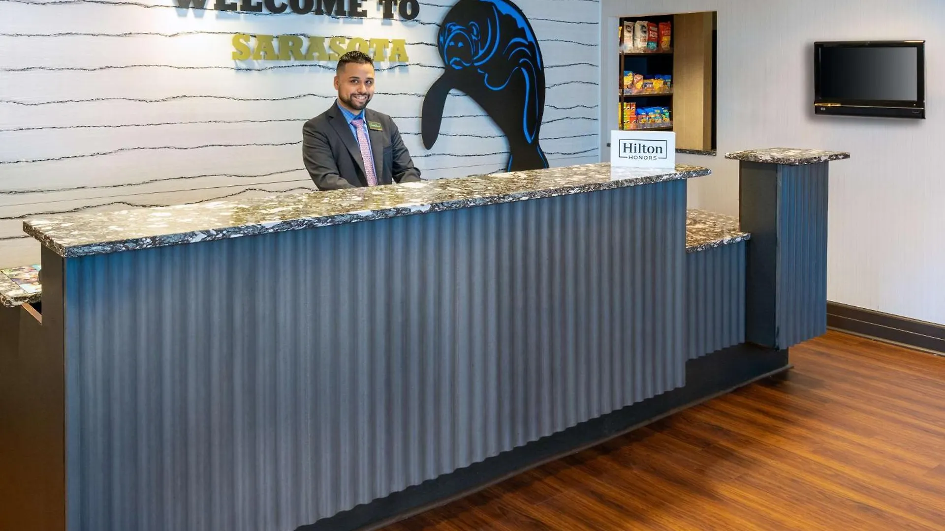 萨拉索塔/克伍德兰奇汉普顿套房酒店.